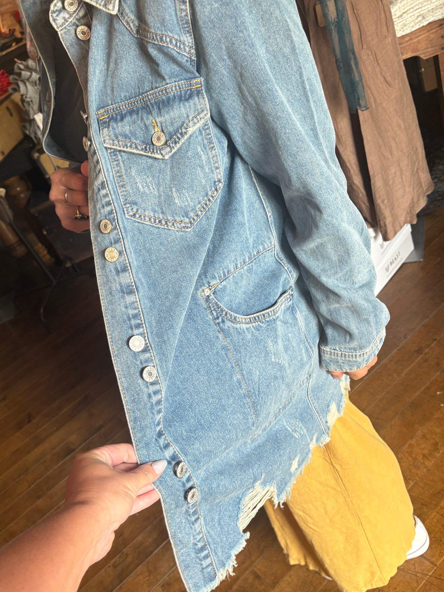 Distressed denim jacket